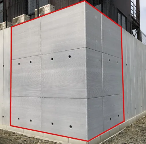 スキャロップペイントを塗装した3Dプリンター製擁壁の外観写真